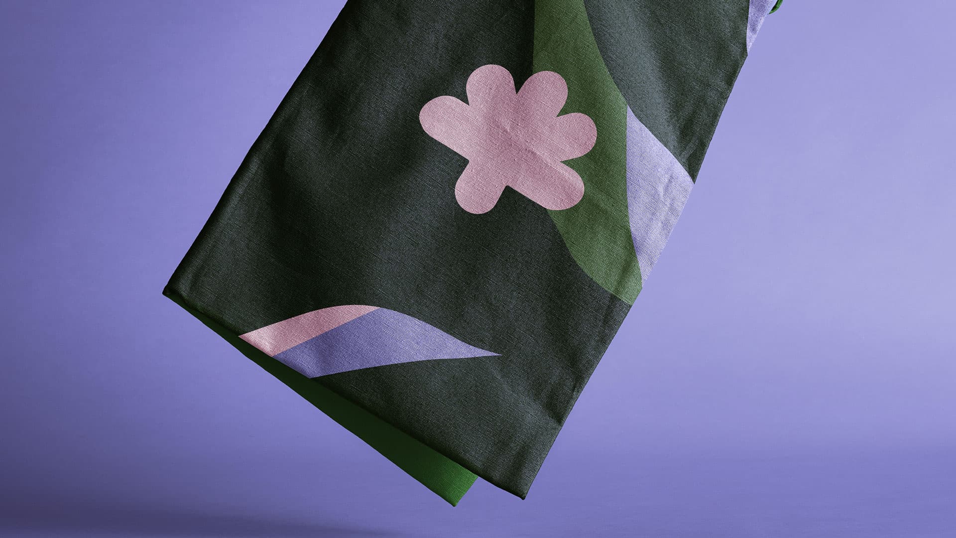 Puralma. A textile in the brand's pattern, caught mid-fall.